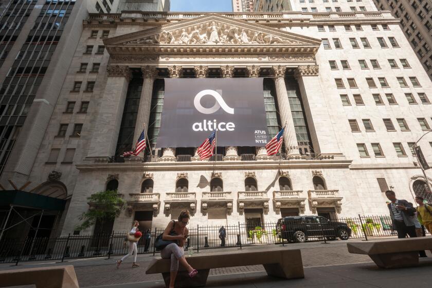 The New York Stock Exchange is decorated for the initial public offering of the cable company Altice USA on Thursday, June 22, 2017.  Altice USA is a subsidiary of Altice NV and is a merger of Cablevision Systems and Suddenlink Communications. It is the f