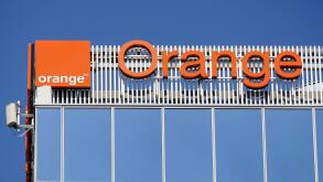 Bucharest, Romania - August 16, 2021: A logo of Orange, French telecommunications company, is displayed on the top of a building, in 'Pipera' neighbor