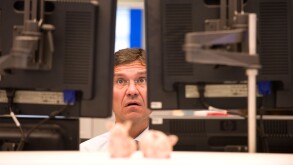 An equity trader at the screen of his computer, Frankfurt am Main, Germany