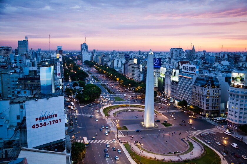 View over Avenida 9 Julio and the obelisk in Plaza Republica, Buenos Aires, Argentina.