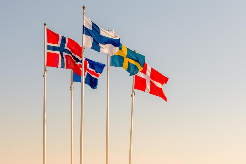 Danish, Swedish, Icelandic, Finnish and Norwegian scandinavian flags waving on the wind in Helsingborg, Sweden