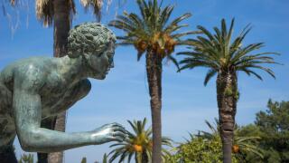 A statue of 'The Runner' in the garden of Achilleion in Corfu palace