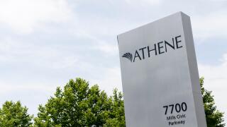 A logo sign outside of a facility occupied by Athene Holding in West Des Moines, Iowa, on June 30, 2018.