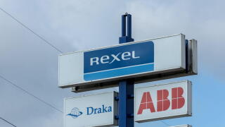 REXEL sign logo at a store. Rexel is the electrical wholesaler with electrical products for residential construction, industry, utilities.