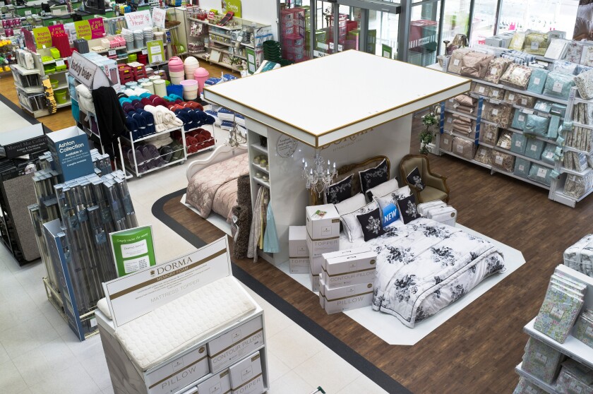 dh Dunelm Mill SHOP UK Bedding shop display interior displaying bed linen stand shops retail floor displays inside store