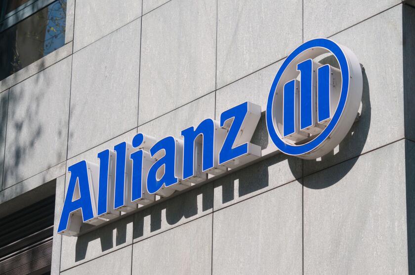Lugano, Switzerland - 30th March 2021 : Allianz company sign hanging on building in Lugano. Allianz is a German multinational financial services compa
