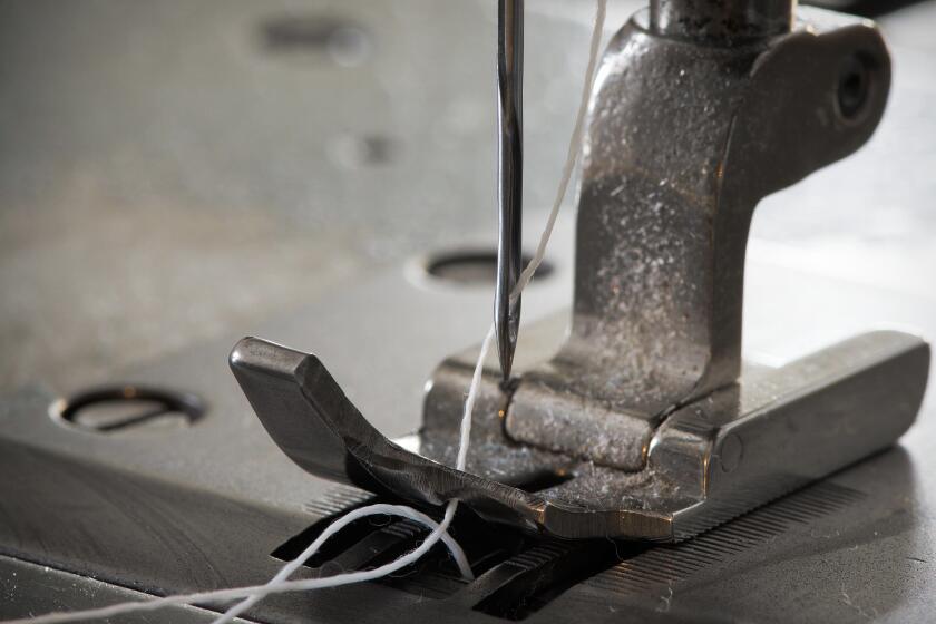 Industrial sewing machine's foot with thread and needle