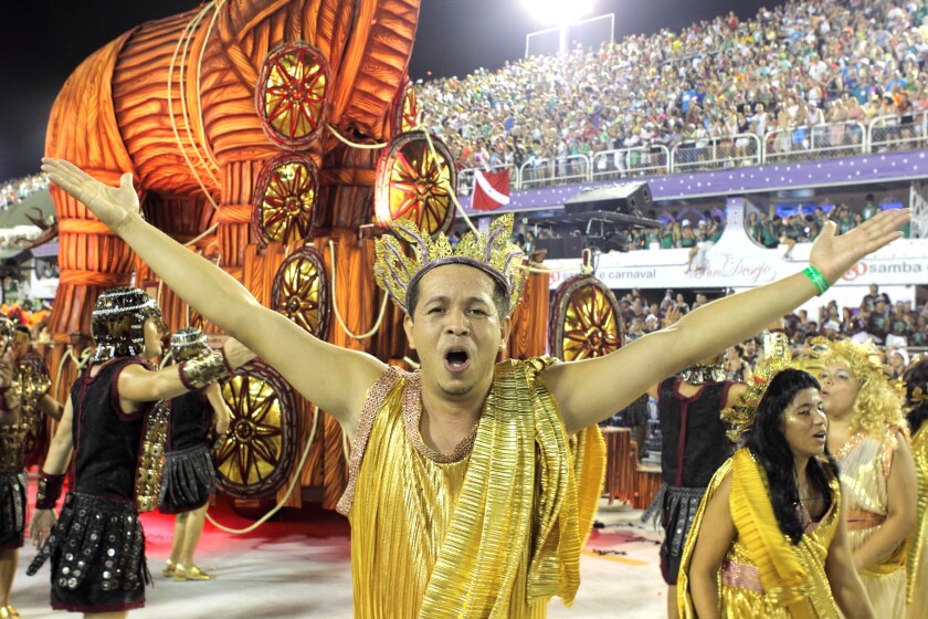 A man in costume celebrating at the Carnival in Rio de Janeiro, Brazil on Monday, 11 February 2013.
