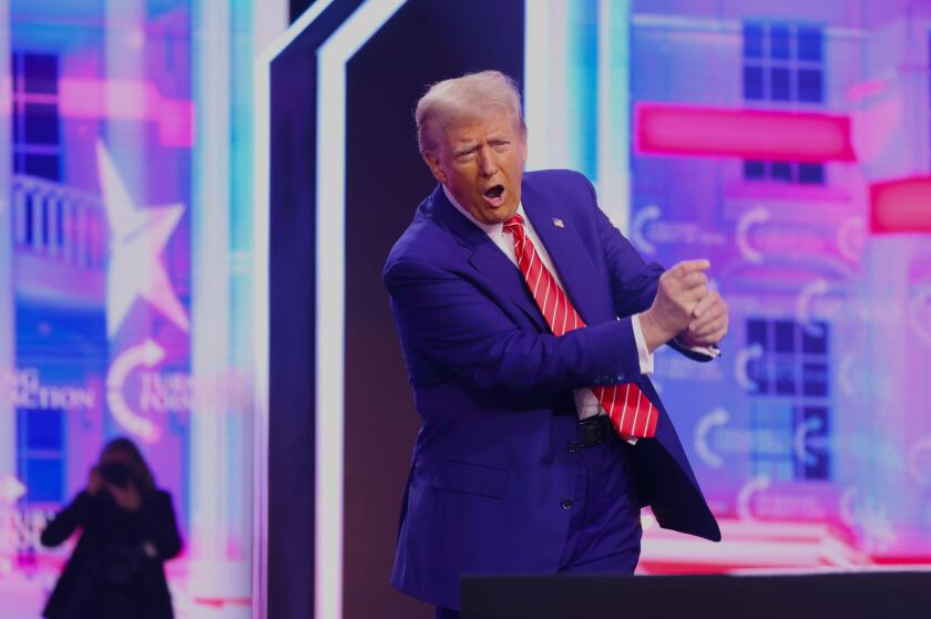 PHOENIX, ARIZONA, USA - 22 December 2024 - President-elect of the United States, Donald Trump addresses attendees at the 2024 AmericaFest at the Phoen