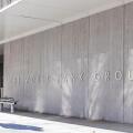 Man walks by a sign for The World Bank Group at their global headquarters in Washington, D.C.