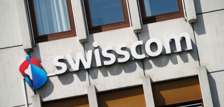 Swisscom AG telecommunications provider sign logo on the side of a building, Switzerland