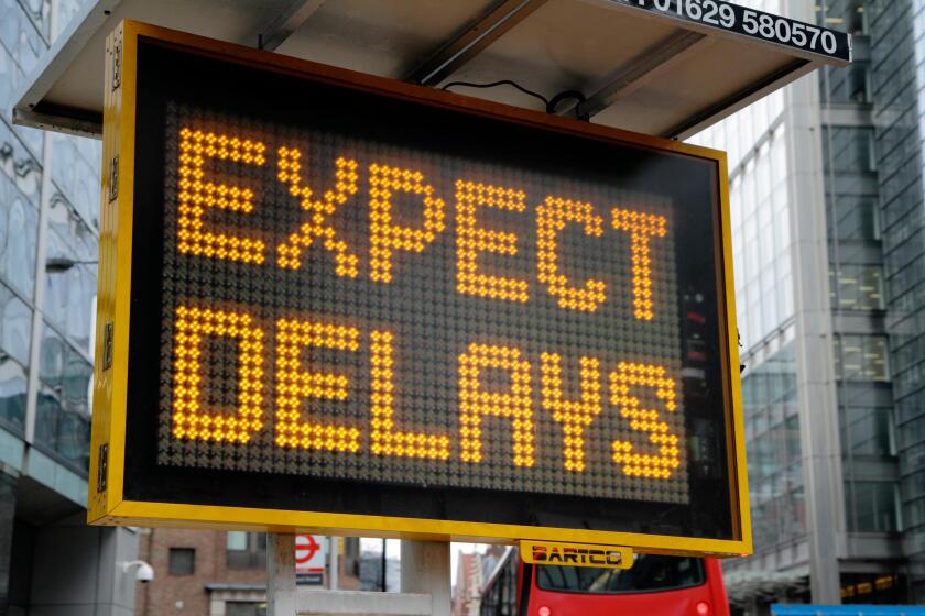 Electronic matrix sign advising of traffic delays, London, UK