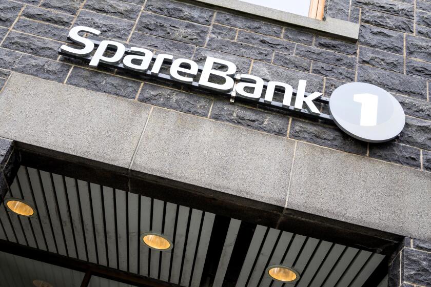 SpareBank 1 sign at branch. SpareBank 1 is a Norwegian alliance and brand name for a group of savings banks.