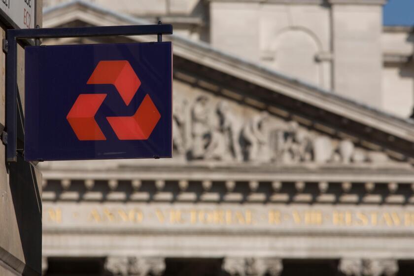 Natwest Bank plc sign and architecture of Cornhill Exchange, City of London.