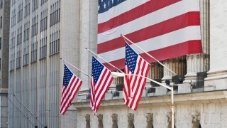 US flags are seen at the New York Stock Exchange.. Image shot 09/2008. Exact date unknown.