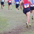 Several male athletes in a popular cross-country race