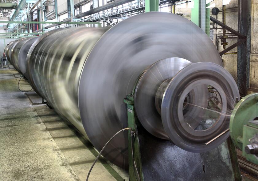 Cable drums turn on the conductor and cabling machine at Prysmian Cablefactory in Schwerin, Germany, 20 April 2010. For the equipment of the new coal powerhouse in the harbour of Rotterdam, the German company with 320 employees has delivered the first bar