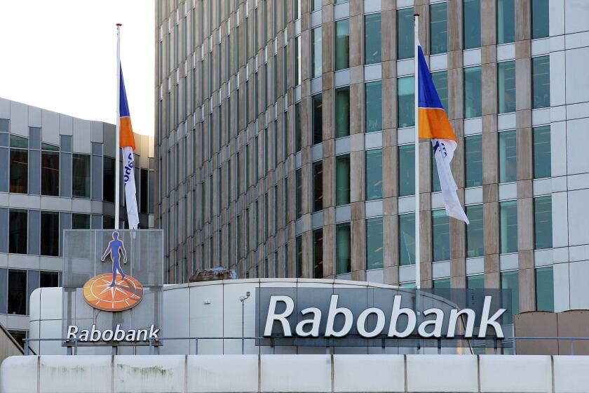 A Rabobank branch in The Hague, Netherlands, is seen on Wednesday, Feb. 7, 2018. (AP Photo/Mike Corder)