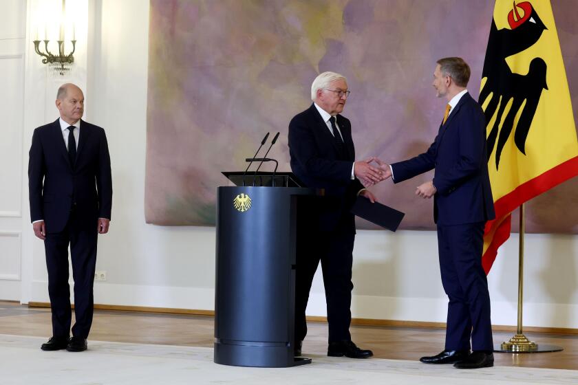 Berlin, Germany. 07th Nov, 2024. Federal President Frank-Walter Steinmeier (M) hands Christian Lindner (r/FDP), former Federal Minister of Finance, his certificate of dismissal at Bellevue Palace. Federal Chancellor Olaf Scholz (SPD) looks on. Credit: Chr