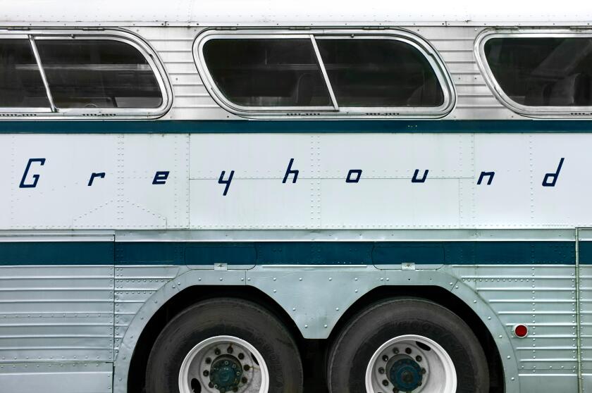 Historic greyhound bus with logo on side