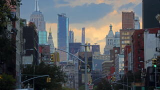 View of the Midtown Manhattan skyline with the Empire State Building from Bowery Street, Manhattan, New York, New York, USA