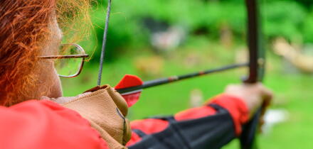 Woman archery, Millstatter See, Nockberge, Niedere Tauern, Carinthia, Austria
