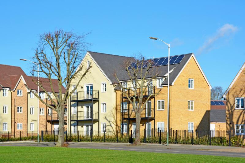 New mixed housing development along main road nearing completion (few occupied some empty) Harold Hill Romford East London England UK