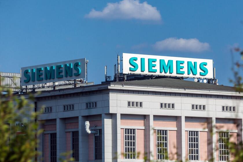 Siemens logo, sign, on rooftop of building, Dresden, Germany Siemens factory
