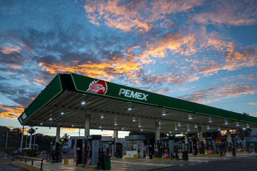 Colorful clouds over a Pemex gas station. San Blas, Nayarit, Mexico.
