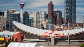 The Scotiabank Saddledome and the city skyline of Calgary, Alberta, Canada