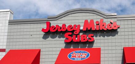 Oshkosh, WI - 25 July 2020:  A storefront sign of Jersey Mikes subs since 1956