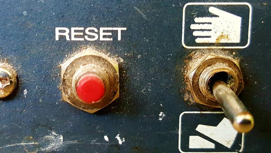 buttons on control panel of an old diry and dusty electric device image