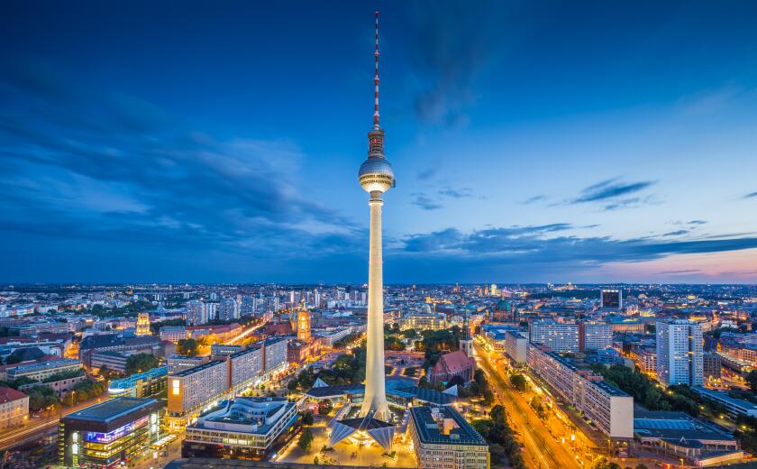 Berlin skyline with famous TV tower at Alexanderplatz in twilight at dusk, Germany