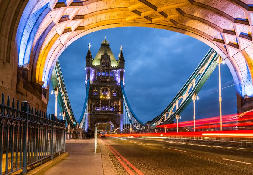 Bridge Tower night view from the bridge, London United Kingdom. A combined bascule and suspension bridge which crosses the River
