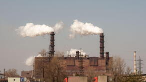Smoke from the pipes of the mining and processing plant. 