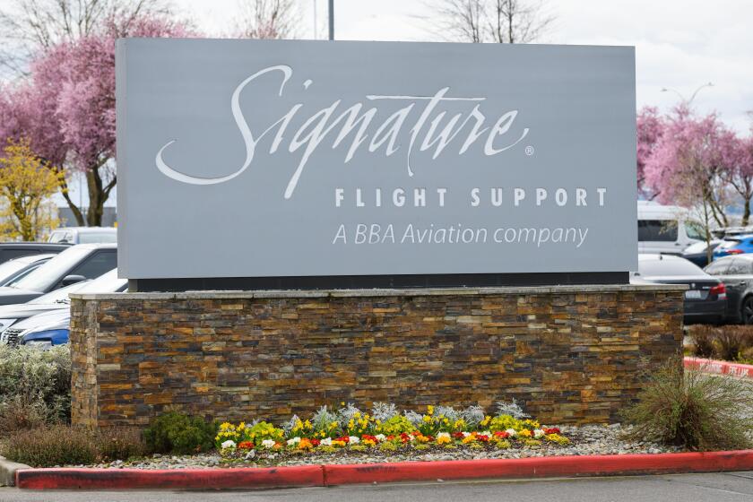 Seattle - March 20, 2022; Sign for Signature Flight Support, A BBA Aviation Company