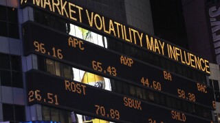 Illuminated stock market board in New York City