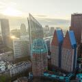 Den Haag, Holland. Business center of The Hague, Netherlands. Cloudy Morning in Summer day, Aerial Drone View.
