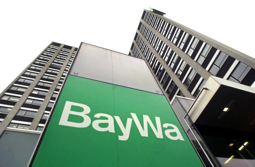 (dpa) - The logo of BayWa, Europe's leading building materials group and agricultural retailer, is seen in front of the administrative building in Munich, Germany, 10 November 2003. Despite the long hot summer and the sluggish economy, the company increas