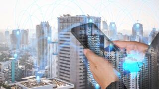 double exposure of woman hand hold and touch screen smartphone, cellphone and lowing line 5G node networking earth on world map background as business