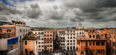 Panorama of Rome photographed from the upper part of the Spanish Steps. In the centre, the famous shopping street: Via Condotti