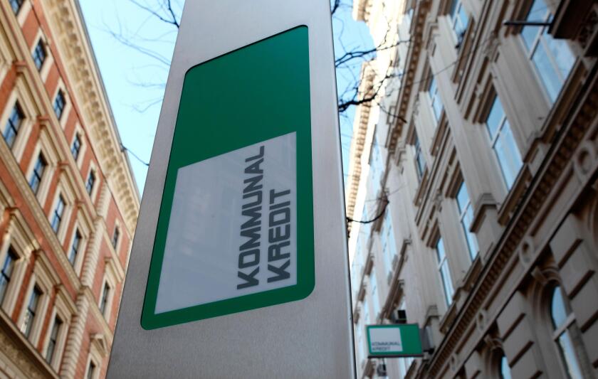 The logo of Kommunalkredit is pictured in front of its headquarters building in Vienna, March 5, 2012. Nationalised Austrian lender Kommunalkredit could need as much as one billion euros ($1.3 billion) as it tries to address its exposure to Greece, the co