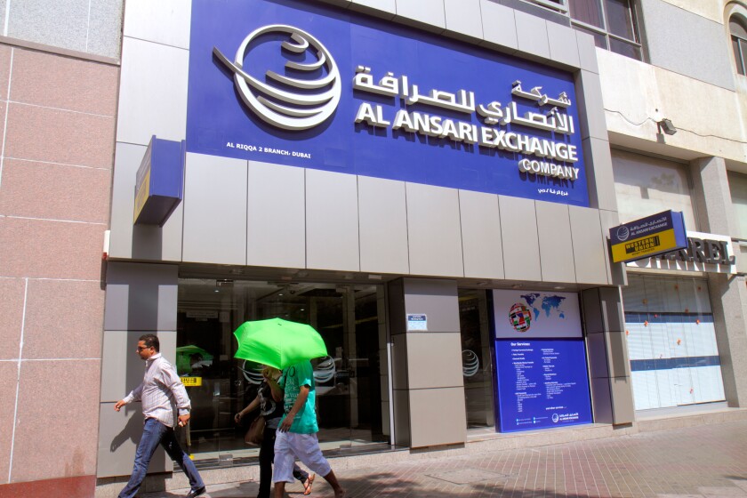 Dubai UAE,United Arab Emirates,Deira,Al Rigga,Al Ansari exchange,shop,Western Union,money wire transfer service,front,entrance,English,Arabic,language