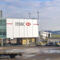 HSBC advertisement, - the HSBC logo at Heathrow airport UK