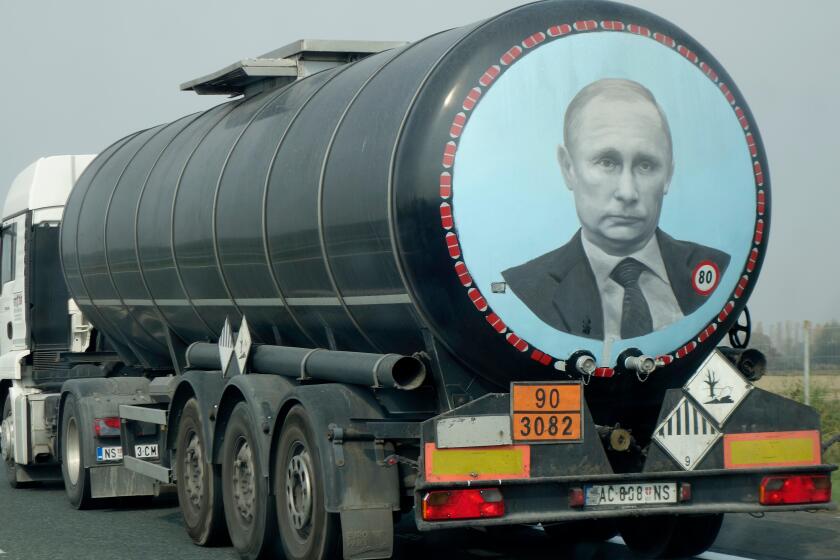 A large tank truck (Serbian licence plate) with image of Vladimir Putin on its rear, drives along the high way through Croatia.