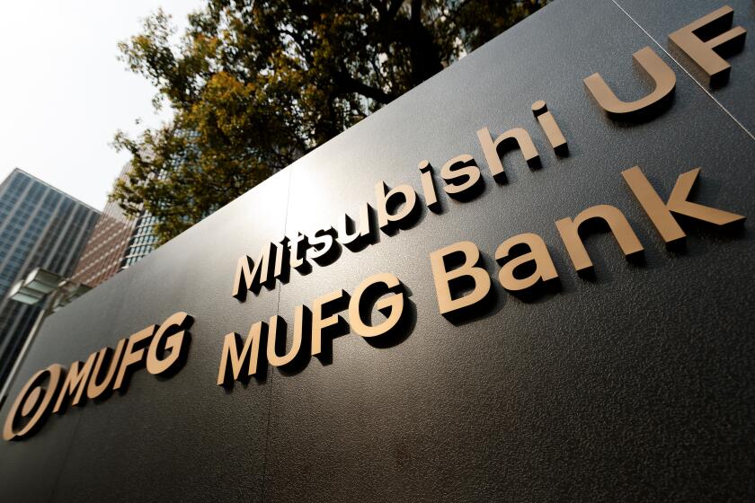 A new signboard of MUFG on display outside its building on April 2, 2018, Tokyo, Japan. Mitsubishi UFJ Financial Group Inc. changed the name of Bank of Tokyo-Mitsubishi UFJ to MUFG Bank after 11 years of merger and complaints from customers saying that th
