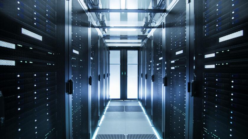 Shot of a Working Data Center With Rows of Rack Servers.