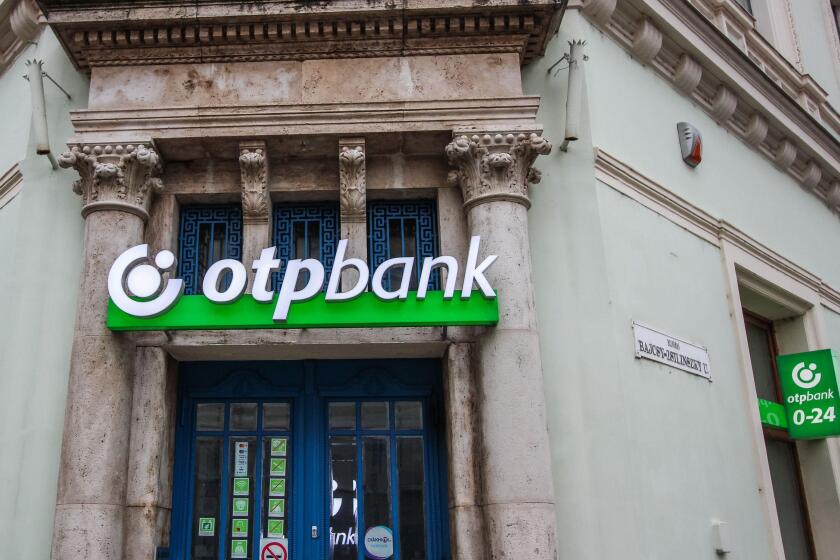 OTP bank (otpbank) logo on a building is seen in Eger, Hungary on 3 November 2019 (Photo by Michal Fludra/NurPhoto)