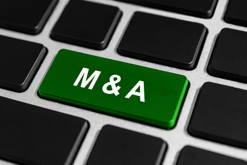 M&A or mergers and acquisitions green button on keyboard, business concept