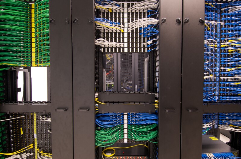 Ethernet cables and sockets neatly arranged in the server racks of a data center at some Hong Kong serviced offices.